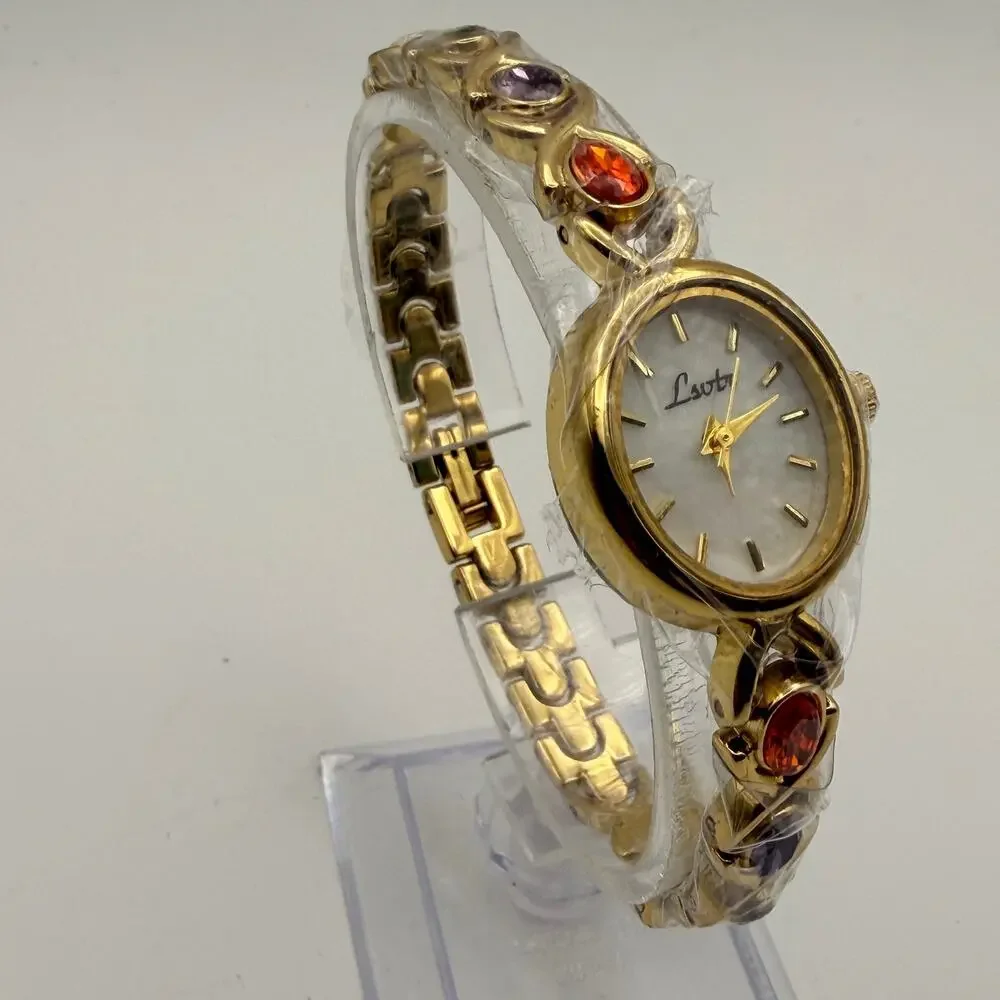 Elegant Gold-Tone Women's Bracelet Watch - Oval Dial & Gemstones New Battery